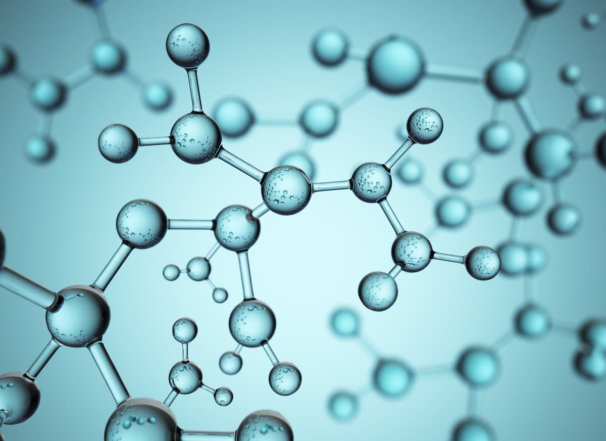 Representación gráfica de una molécula con esferas metálicas y enlaces, simbolizando la estructura química en un contexto de investigación científica y desarrollo tecnológico.